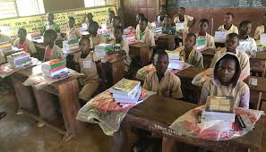 Benin mp Gafari Adéchokan distributes school kits to hundreds of students