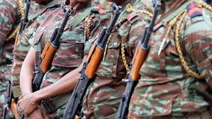 Benin soldier and police officer face court over desertion